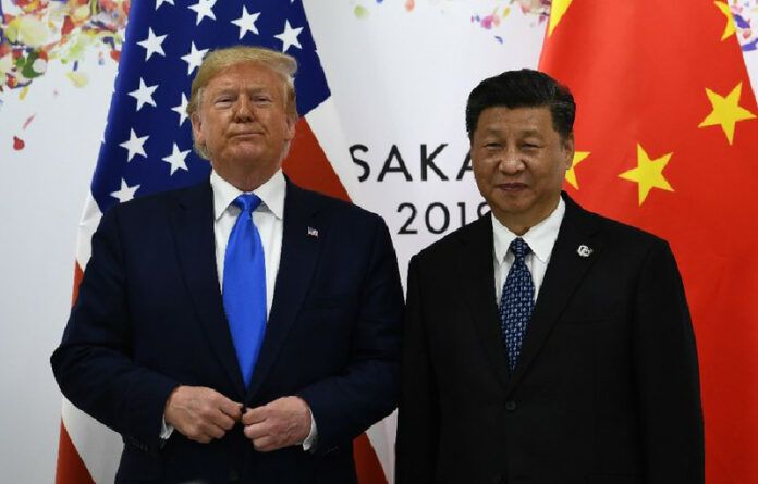 En una imagen de archivo, el presidente estadunidense Donald Trump y su homólogo chino Xi Jinping (derecha) durante una reunión bilateral al margen de la Cumbre del G20 en Osaka, Japón, el 29 de junio de 2019. Foto Afp.