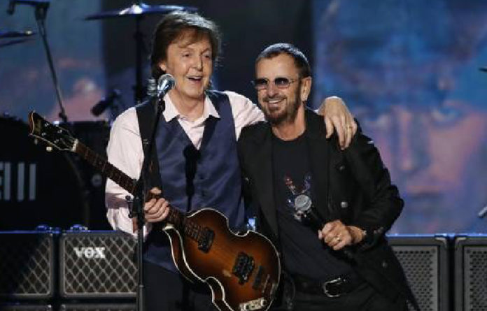 Los ex beatles, durante un concierto para celebrar los 50 años de la aparición de cuarteto de Liverpool. Foto Reuters / Archivo.